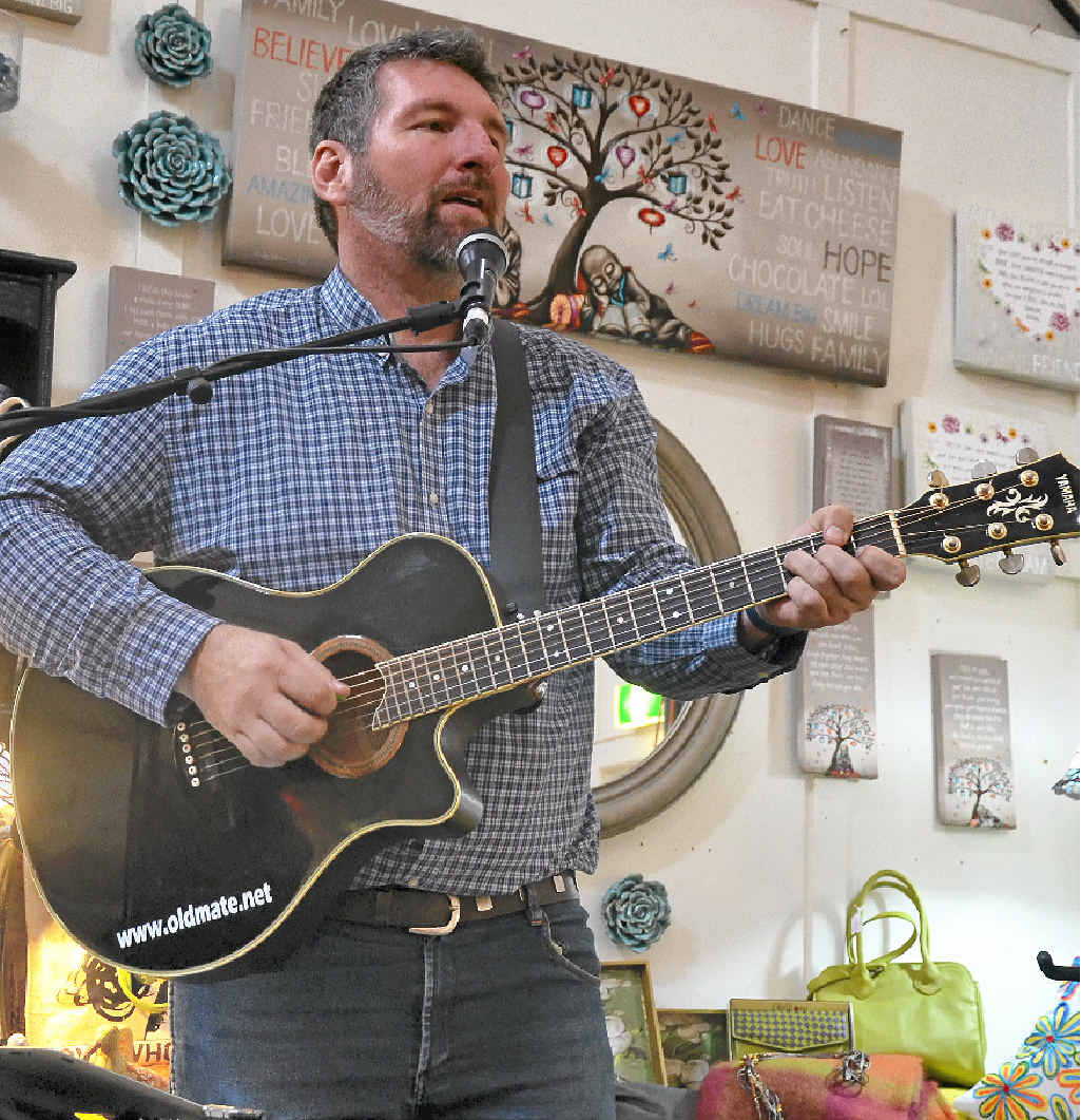 Andrew Kucks perfroming at Bryson’s Place for the Jumpers and Jazz festival.